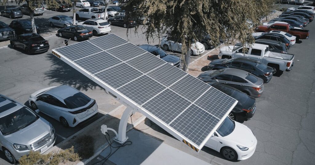 pexels-photo-9800031-9800031 Electric cars charging at a solar-powered station in a parking lot.